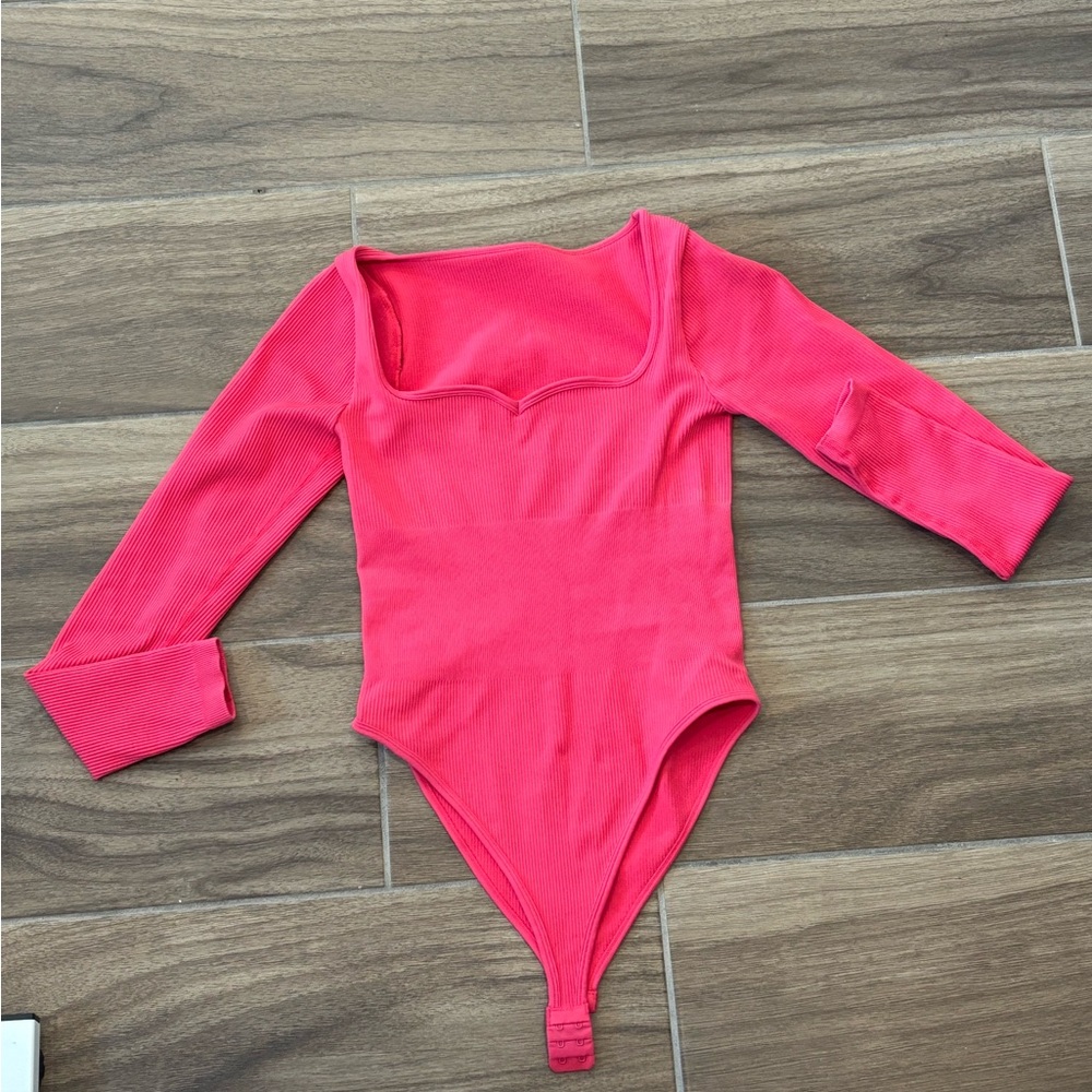 Vibrant Pink body suit